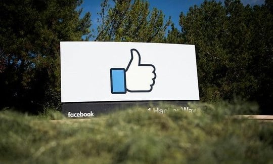 Facebook profit jumps as user base nears 2 billion